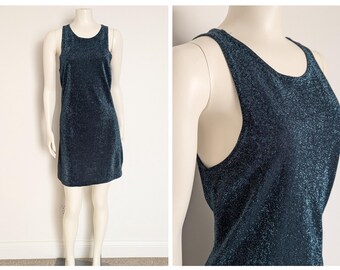 May include: A sleeveless, dark teal, sparkly dress with a scoop neck.