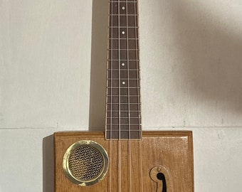 Electric/acoustic cigar box ukulele