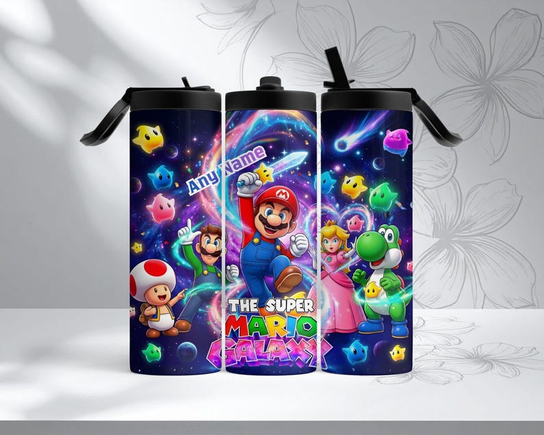May include: A set of three insulated tumblers featuring a vibrant design from the Super Mario Galaxy game. Each tumbler has a black lid and straw, with a colorful wrap-around print of Mario, Luigi, Princess Peach, Yoshi, and other characters.