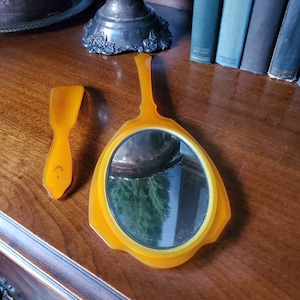 Vintage Butterscotch Celluloid Bakelite Hand Held Vanity Mirror and Shoehorn Dresser Set