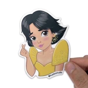 May include: A sticker featuring a cartoon illustration of a woman with dark hair and brown eyes. She wears a yellow dress and earrings. The sticker has the text "@KuailinStudio" at the bottom.