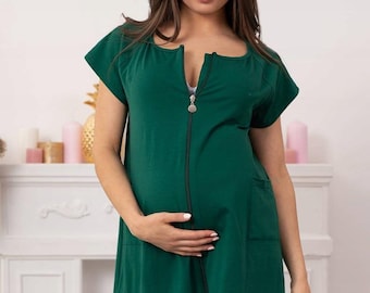 May include: A dark green maternity nightgown with a zipper down the front and a pocket on the side.
