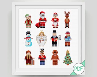 Può includere: Uno schema di punto croce con 12 personaggi natalizi, tra cui Babbo Natale, un angelo, un pupazzo di neve, un uomo di pan di zenzero e un albero di Natale. I personaggi sono tutti pixelati e hanno un aspetto retrò, simile a quello dei Lego.