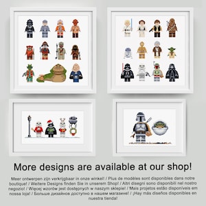 May include: A collection of framed cross-stitch patterns featuring various Star Wars characters, including Yoda, Darth Vader, Chewbacca, and R2-D2. The designs are available for purchase at the shop.