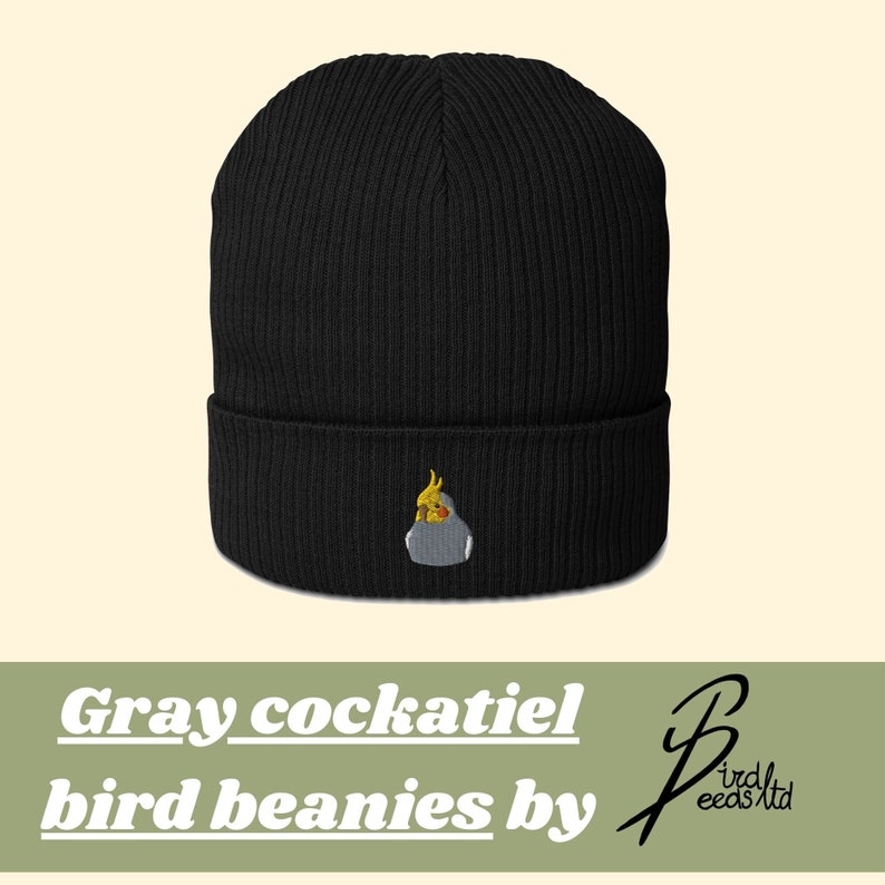 Promotional photo: black beanie with embroidery of a gray cockatiel.