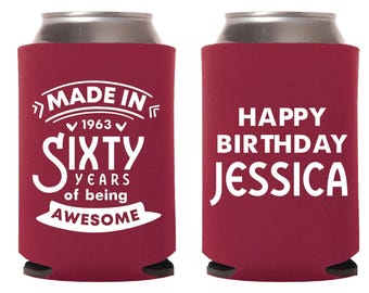 May include: A maroon can cooler with white text. One side reads "MADE IN 1963 SIXTY YEARS of being AWESOME." The other side says "HAPPY BIRTHDAY JESSICA."