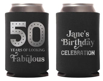 May include: Black can coolers with silver text. One cooler reads "50 YEARS OF LOOKING Fabulous" with the number 50 in a dotted font. The other cooler says "Jane's Birthday CELEBRATION".