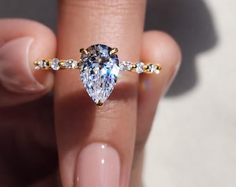 Pear Shaped Pave Setting 1.5 Carat Moissanite 18k Yellow Gold Engagement Ring with Prong Setting