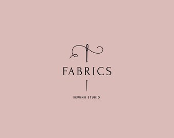 May include: Black and white logo for a sewing studio called "Fabrics". The logo features a stylized needle and thread.