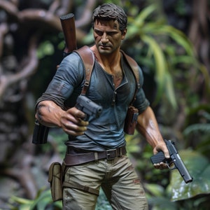 May include: A figurine of a man wearing a blue shirt, brown trousers, and a brown leather belt. He is holding two black handguns and has a brown leather strap across his chest.