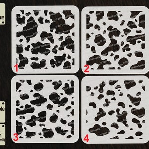 May include: Four reusable stencils featuring a cow print design. The stencils are made from 1 mm thick APET plastic and are numbered 1 to 4.
