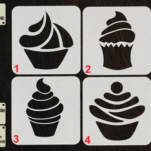 May include: Four reusable plastic stencils for decorating cookies. Each stencil features a different design of a cupcake. The stencils are white and the cupcake designs are black.