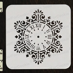 May include: White reusable stencil featuring a clock face design. The clock face has Roman numerals and a decorative border. The stencil is made from 1 mm thick APET plastic.