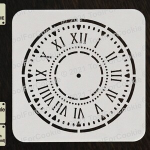 May include: White reusable stencil of a clock face with Roman numerals. The stencil is made of 1000 micron APET plastic, which is 1 mm thick.