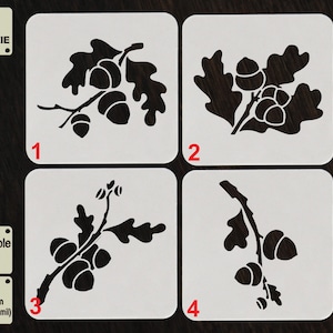 May include: Four black and white cookie stencils with acorn and leaf designs. The stencils are labelled 1 through 4. The text "TOOL FOR COOKIE" is in the top left corner. The text "Reusable Stencil" and "APET 1000 micron (1 mm/40 mil)" is in the bottom left corner.