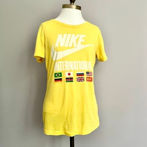 Vintage 90s Nike Track & Field International Lemon Yellow Flags Tshirt - S