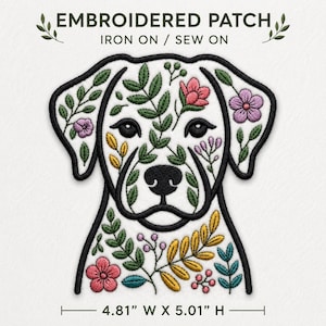 May include: An embroidered patch featuring a dog head silhouette filled with floral and botanical patterns in pink, purple, yellow, and green. The patch has a black border and text reading EMBROIDERED PATCH IRON ON / SEW ON, measuring 4.81 inches W x 5.01 inches H.