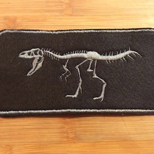 Embroidered Dinosaur Skeleton Tyrannosaurus Skeleton Skull Patch Sew/Iron-On by Twistedstitcher 2018 Located in Abbotsford BC Canada