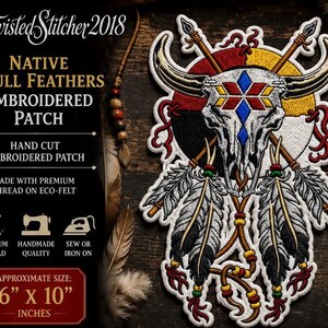 May include: An embroidered patch featuring a white bull skull with a geometric red, yellow, and blue pattern on the forehead, set against a circular background with crossed spears and hanging feathers. The patch measures 15.24 cm by 25.4 cm.