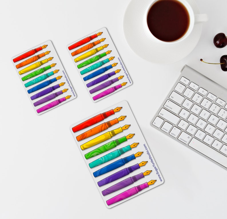 May include: Three sets of rainbow colored fountain pen stickers. Each set has 10 stickers with a different color and pattern. The stickers are on a white background. The text on the stickers reads "www.SugarTurtleStudio.com".