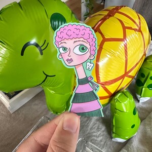 Sticker fille dent en vinyle