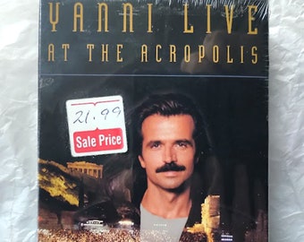 NEW*- Factory Sealed - YANNI Live At The Acropolis (1994) -VHS/ Hi-Fi Stereo/ Live Concert/ Royal Philharmonic Concert Orchestra/ Interviews