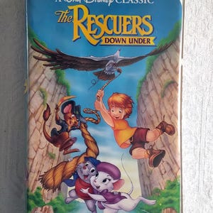 The Rescuers Down Under - VHS / Walt Disney Black Diamond Classic/ Clam Shell Case/ Digitally Mastered/ Eva Gabor/ Bob Newhart/ *EXCELLENT*