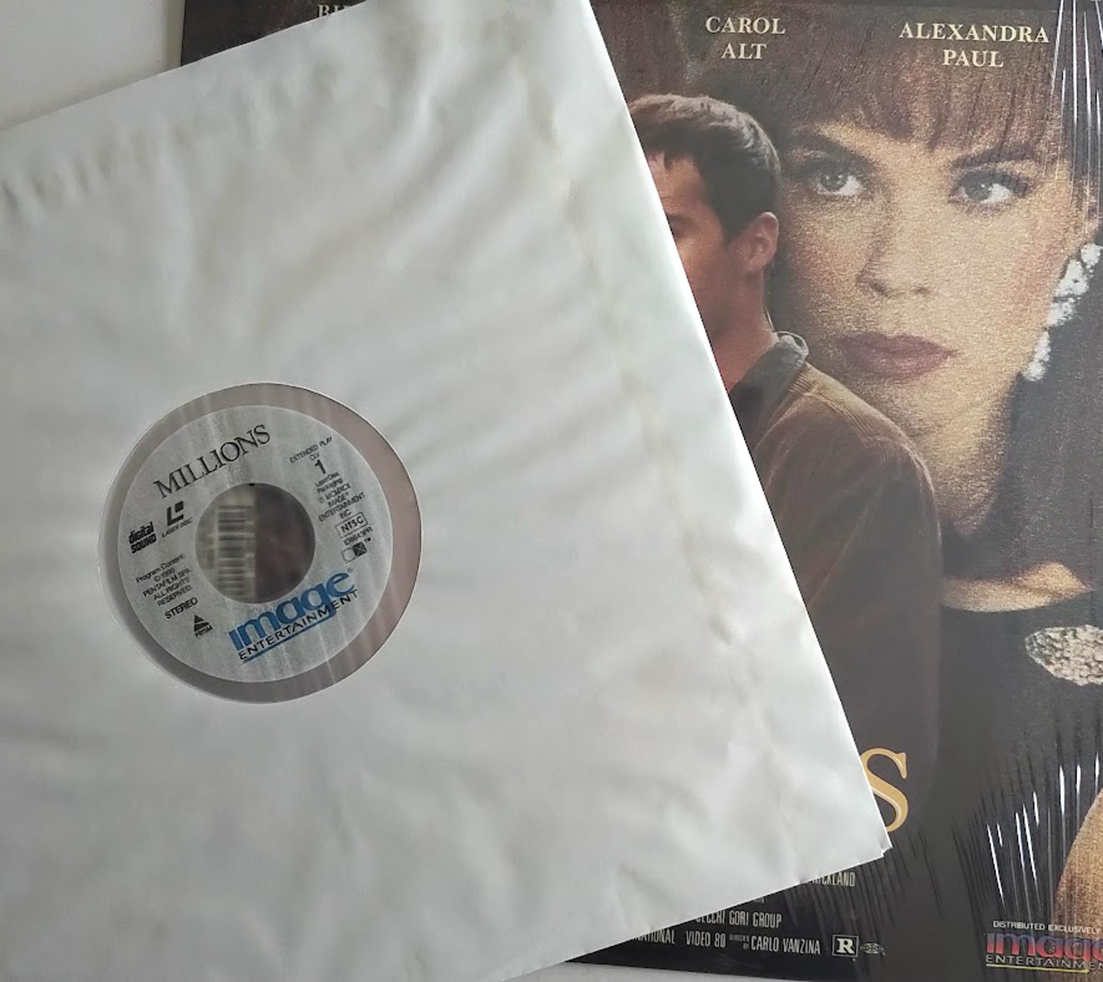 Millions (1991) - Laser Disc (1992) / Extended Play / Dolby