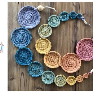 Crocheted cervix stencils in soft rainbow colors - teaching chain for midwives - teaching aids - teaching model for birth preparation