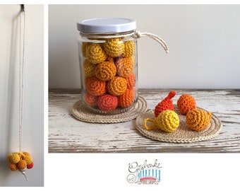 crocheted birth counter in shades of yellow and orange - hanging baby counter - work tool for midwives and doulas