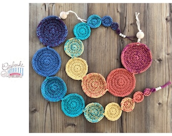 Crocheted cervix stencils in warm rainbow colors - teaching chain for midwives - teaching aids - teaching model for birth preparation
