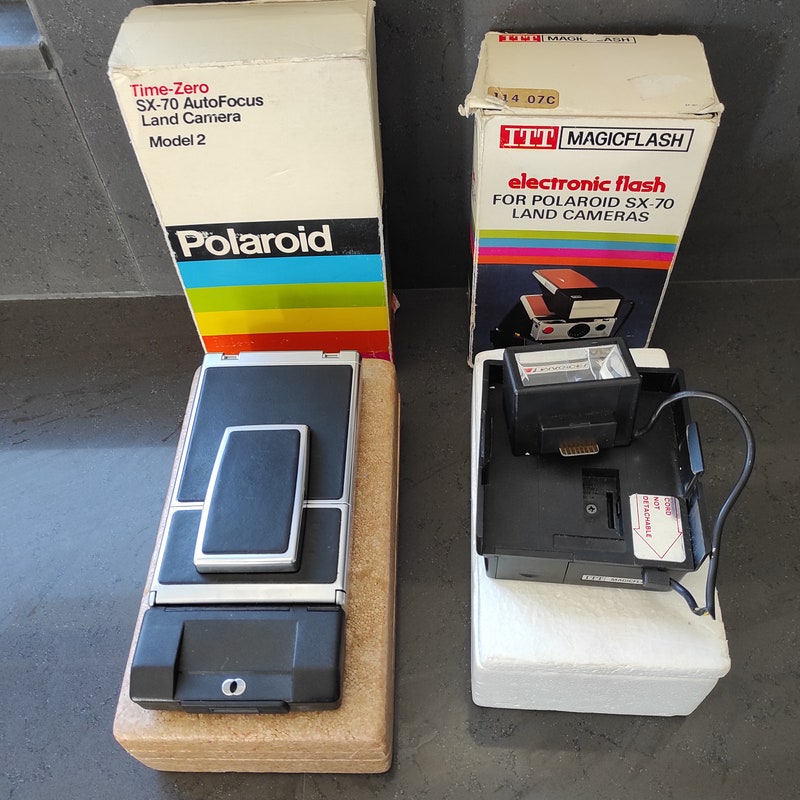 Appareil Photo Polaroid SX-70 Avec Poignée Sunpak - Occasion état Fonctionnel
