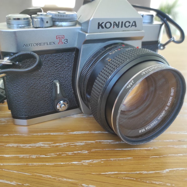Konica Autoreflex T3 Camera, 35 mm Camera, With 50 mm F1.7 Lens And Konica Strap