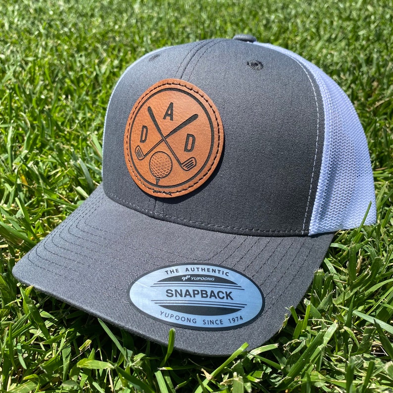 Dad golf hat. Golf Dad hat. Fathers Day Golf hat. Golf trucker hat. Leather patch hat for a golf dad. Fathers who golf. Golf snapback