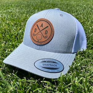 Dad golf hat. Golf Dad hat. Fathers Day Golf hat. Golf trucker hat. Leather patch hat for a golf dad. Fathers who golf. Golf snapback