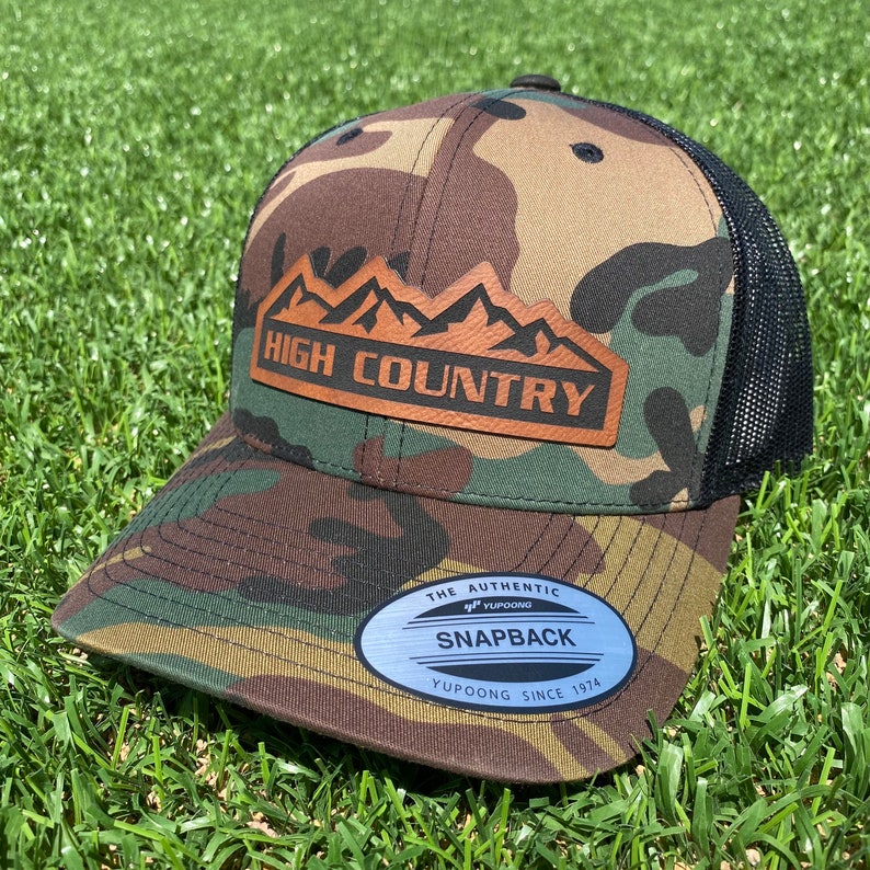 Camo High Country Trucker Hat. Chevrolet High Country Leather patch hat. Chevy High Country Cap. Snapback.