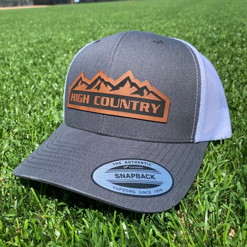 Charcoal High Country Trucker Hat. Chevrolet High Country Leather patch hat. Chevy High Country Cap. Snapback.