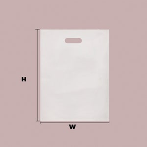May include: A white plastic bag with a handle cut-out. The bag is shown against a light pink background. The bag is labeled with a "W" for width and an "H" for height.