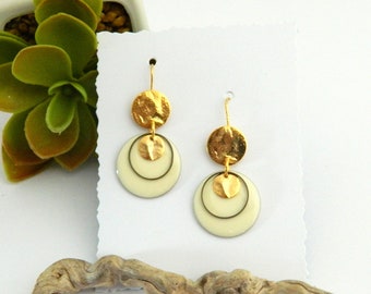 Golden earrings with fine gold and white enamel