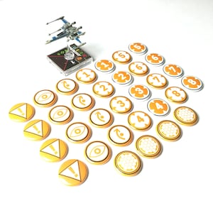 O estilo REBELDE de tokens X-Wing compatíveis com o jogo Star Wars 2.0 Miniatures