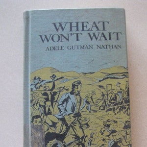 May include: A vintage hardcover book titled "Wheat Won't Wait" by Adele Gutman Nathan. The cover features a black and white illustration of people working in a field.