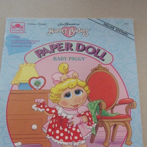 Golden, Jim Henson's Muppet Babies Paper Doll Baby Piggy, 1-doll, 35 pre-cut out fits & Accessories, tote, 1991
