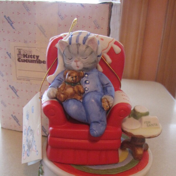 Kitty Cucumber Music Box, Plays Silent Night as it Turns, Has tags attached, 1988