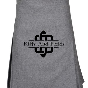 May include: A gray kilt with a black Celtic knot design and the text "Kilts And Plaids" in a banner.