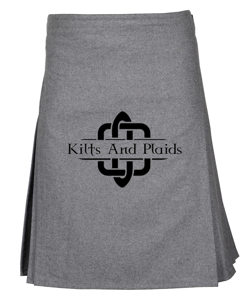 May include: A gray kilt with a black Celtic knot design and the text "Kilts And Plaids" in a banner.