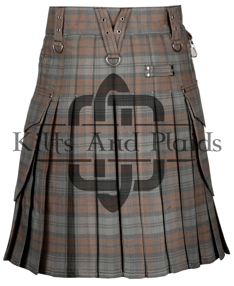 May include: A brown and gray plaid kilt with cargo pockets and a leather strap with buckles. The kilt has a D-ring on the front and a buckle on the side.