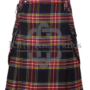 May include: A black, red, yellow, and blue tartan kilt with a pleated design and two large pockets on the sides. The kilt has a silver buckle and two silver rings on the waistband.