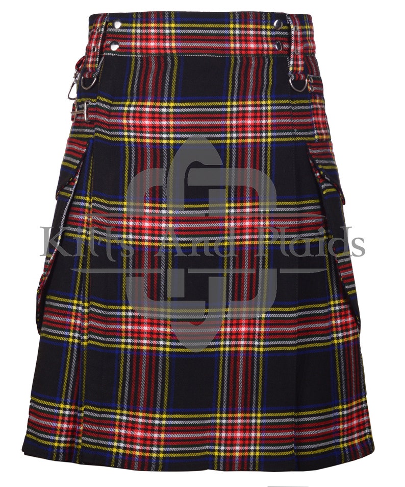 May include: A black, red, yellow, and blue tartan kilt with a pleated design and two large pockets on the sides. The kilt has a silver buckle and two silver rings on the waistband.