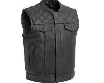 May include: Black leather motorcycle vest with a quilted diamond pattern on the front and back. The vest has a zipper closure and two pockets on the front.