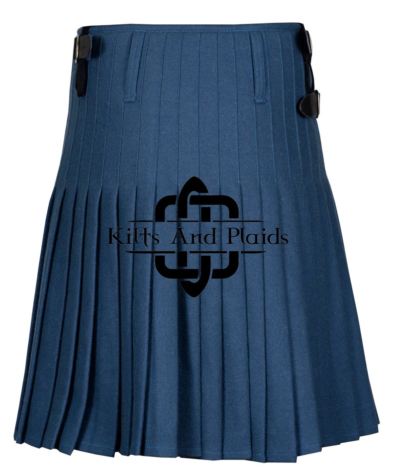 May include: A blue kilt with pleats and black buckles. The kilt has the text "Kilts And Plaids" printed on it.